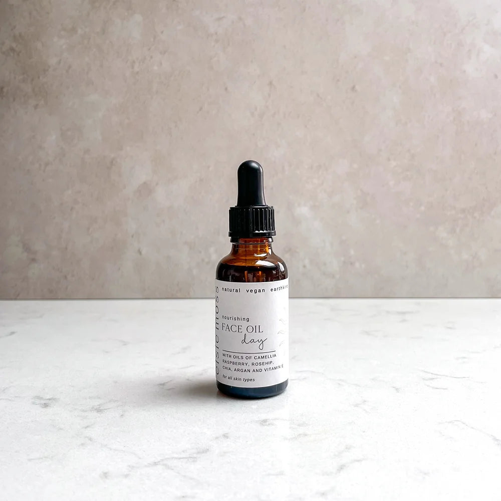 Nourishing Face Oil for Day Time in an amber bottle with pipette