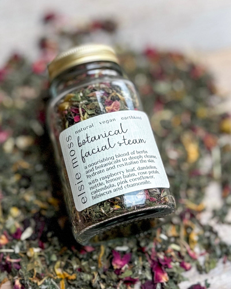 Glass jar filled with dried botanicals