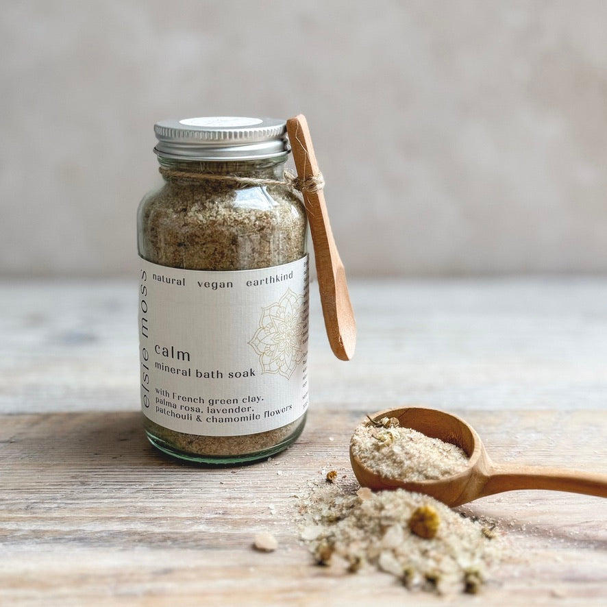 Jar of Calm Bath Soak with wooden spoon