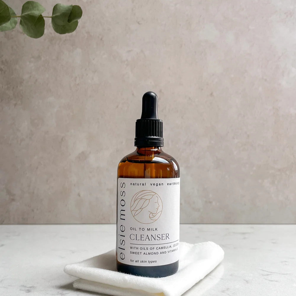 Oil to Milk Cleanser 100ml in an amber bottle with pipette