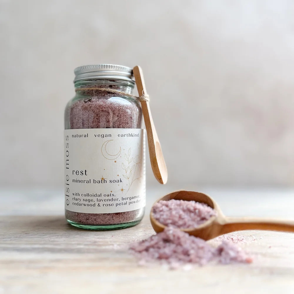 jar of Rest bath salts with wooden spoon
