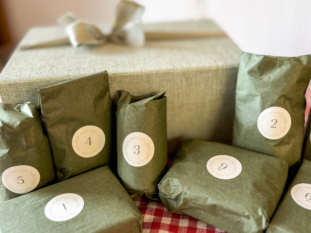 Green packages with numbered labels on a checkered tablecloth