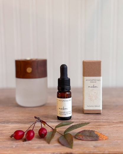A small amber dropper bottle labeled &