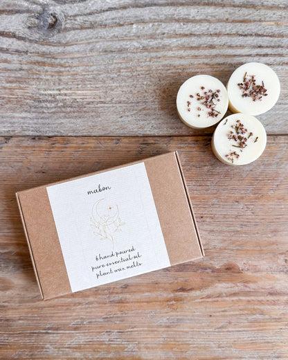 A kraft paper box labeled &
