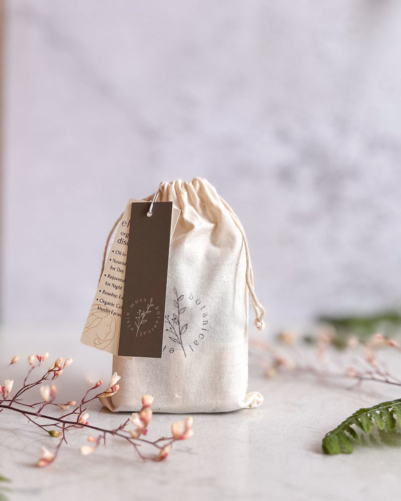 White drawstring bag with a label on a light background